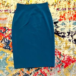 Woman’s teal blue pencil skirt